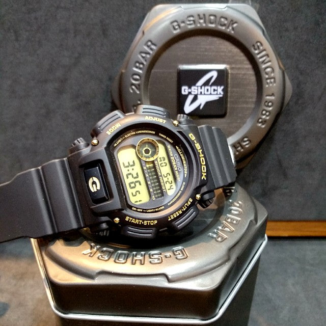 G shock illuminator black and gold new arrivals